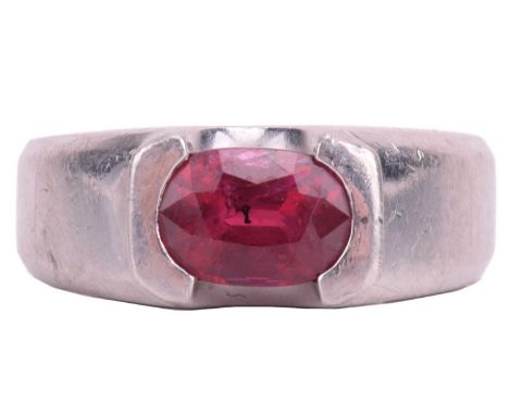 A ruby single stone ring, the oval ruby measuring approximately 8.4 x 5.9 x 5mm, to a ring mount marked 'PT', ring size O. To