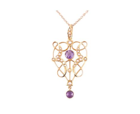 An Edwardian amethyst and seed pearl pendant on chain, the heart-shaped scrollwork mount centred with a circular-cut amethyst