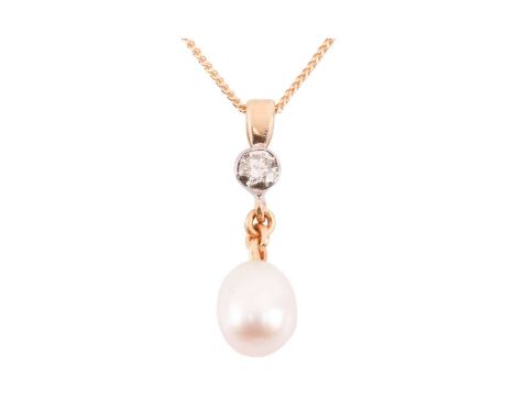 A cultured pearl and diamond pendant on chain, comprising an egg-shaped freshwater cultured pearl of 11.1 x 9.2 mm, dangling 