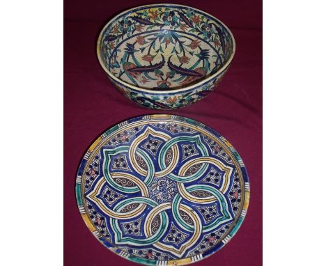 Large 19th C Isnik type bowl with floral detail (diameter 32cm) and a similar charger on raised foot rim with signature panel
