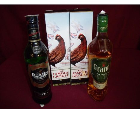 Grants 70cl Sherry Cask Finish No 2 Scotch Whisky, a Glenfiddich Aged 12 Years Special Reserve and two boxed bottles of Famou