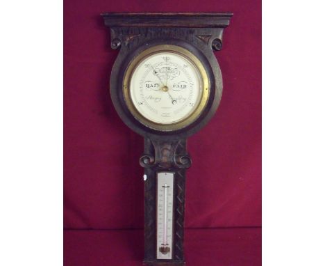 Early-mid 20th C carved oak cased wall barometer by Collingwood &amp; Son Ltd Middlesbrough (length 66cm) 
