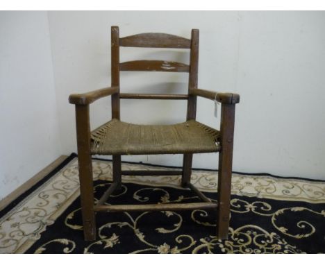 19th C country style painted ladder back armchair with string work seat 