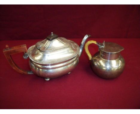 Sheffield silver hallmarked 1927 teapot of bulbous form with wicker woven grip (12cm high) and a Birmingham silver hallmarked