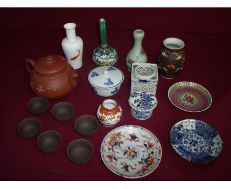 Selection of various assorted oriental ceramics including terracotta teapot and tea bowls, goldfish vase with eight digit sig