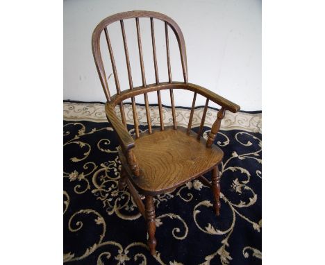 Small child's elm stick back Windsor chair on turned supports and H shaped under stretcher 