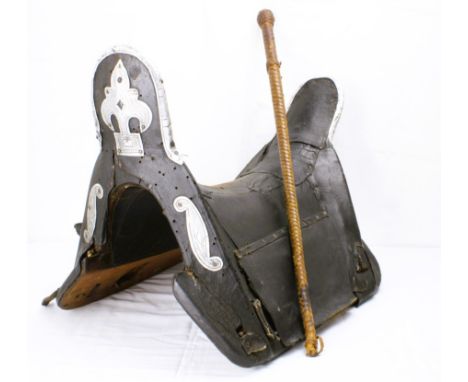 This is a beautiful Ottoman Pasha Horse saddle and whip. Made from leather and decorate with silver on the front and the back