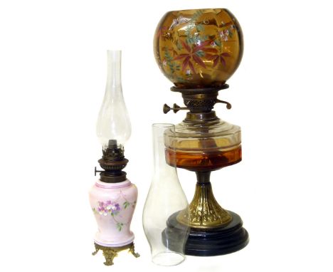 Victorian oil lamp with embossed brass base and hand painted shade and smaller lamp Condition reports are not available for o