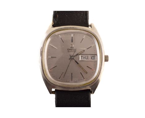 An Omega stainless steel quartz wristwatch, the cushion shape signed silvered dial with baton hour markers, day and date aper