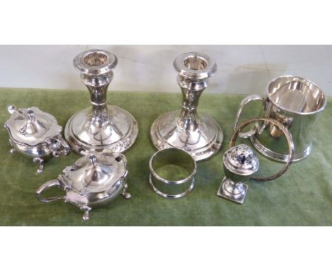 Pair of weighted silver candlesticks, pair silver mustards, pepperettes, silver tankard, napkin ring and 925 bangle. Conditio