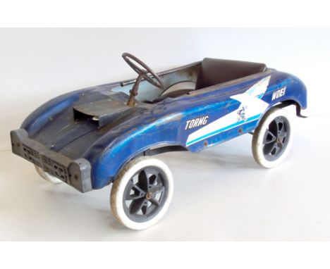 Vintage Torng Woei peddle car, 87cm long. Condition reports are not available for our Interiors Sales
