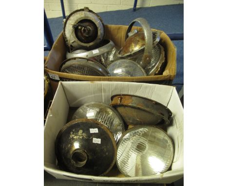 Two boxes of assorted Lucas and other car headlamp units.(B.P. 24% incl. VAT)