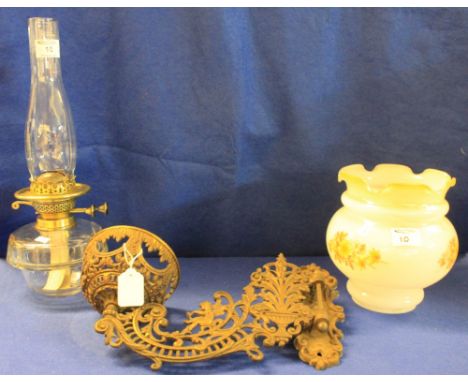 Duplex double burner oil lamp with clear reservoir and funnel, together with brass finish, cherub decorated wall sconce and f