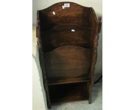 Early 20th Century oak magazine rack on barley twist supports and under shelf. (B.P. 24% incl. VAT)