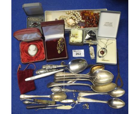 Bag of assorted, mainly costume jewellery, to include: various earrings; cameo brooch; pearls; Egyptian design ingot; button 