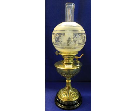 Early 20th Century brass single burner oil lamp with florally decorated, spherical shade and funnel.(B.P. 24% incl. VAT)