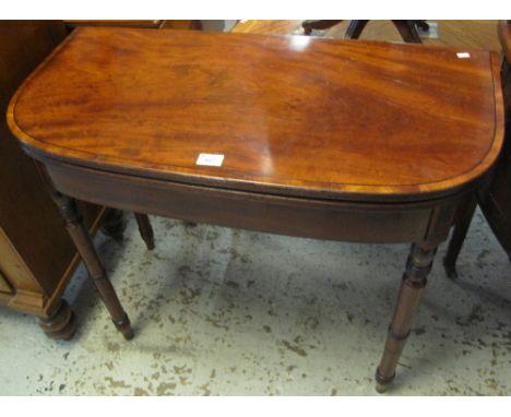 19th Century mahogany 'D' end, folding card table on ring turned legs.(B.P. 24% incl. VAT)