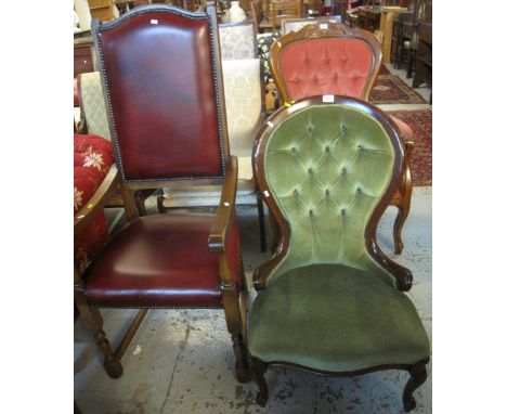 Victorian style mahogany show frame, button back nursing chair, together with a 20th Century high backed, open arm dining cha