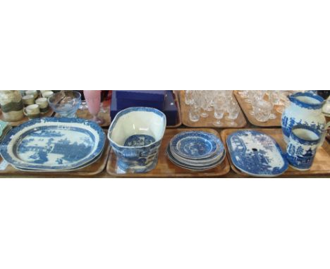 Three trays of 19th Century blue and white transfer printed items to include: oval meat dishes; plates; drip tray; straight s