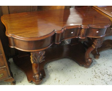 Victorian mahogany Duchess type dressing table on scroll supports and under shelf.(B.P. 24% incl. VAT)