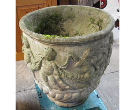 Large baluster garden planter with relief cherub decoration. (B.P. 24% incl. VAT)
