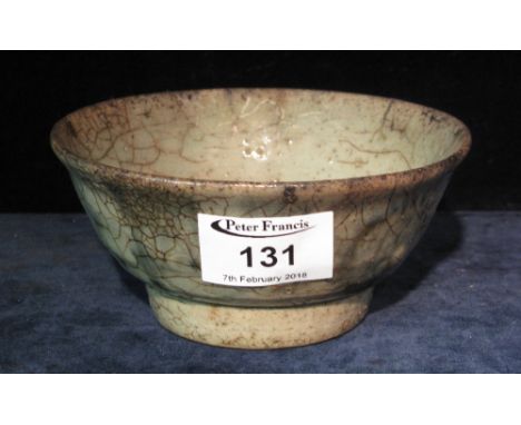 Chinese Ming style stoneware provincial bowl decorated with underglaze cobalt blue, depicting a stylised lotus scroll, having
