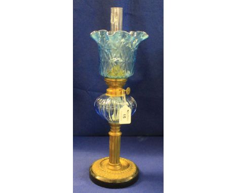 Early 20th Century brass Corinthian column single burner oil lamp marked: 'made in France, Gaudard', with blue glass reservoi