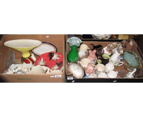Two boxes of assorted china and glass to include: two Wade NatWest pigs; commemorative mugs; Nao figures; Continental wares; 