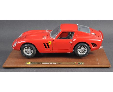 Estate of Dave Prowse - an original Bburago made 1/18 scale diecast Ferrari 250 GTO car. A red example presented on a wooden 