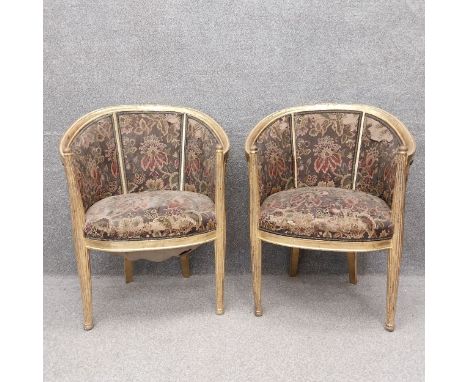 A pair of Louis XVI style gilt salon chairs with needlework/tapestry upholstery on tapering fluted supports. H.86.5cm