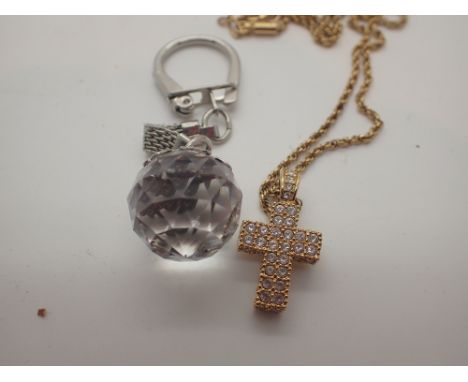 Boxed Swarovski keyring and a cross pendant 