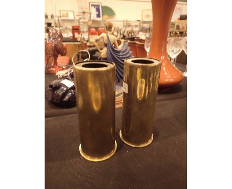 Two brass spent jet engine starter cartridges 