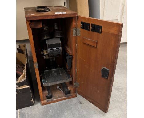 A cased microscope