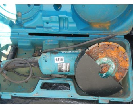A Makita GA9020 9" angle grinder