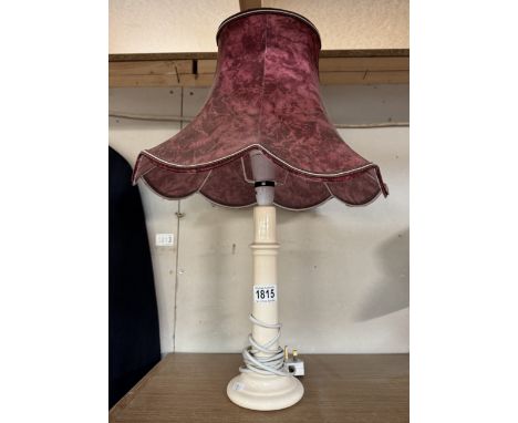 A porcelain table lamp with shade