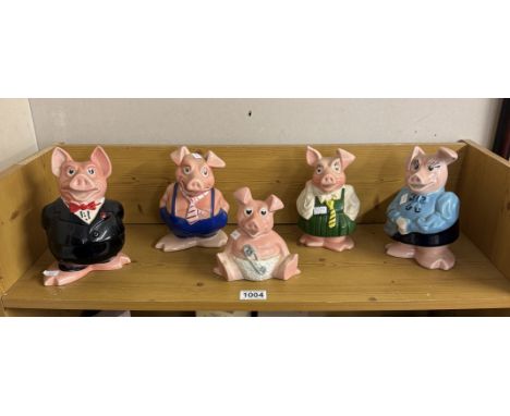A quantity of Wade Nat West pig money boxes