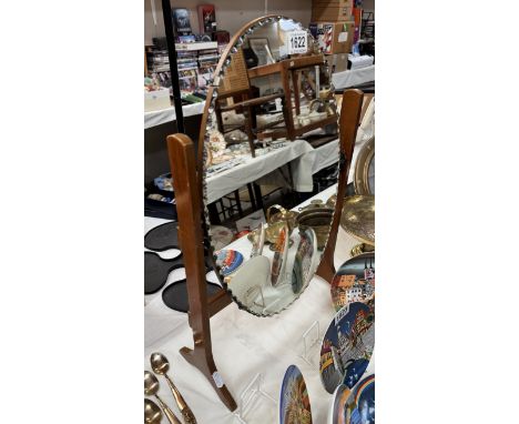 A vintage pie crust bevel edge dressing table mirror