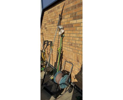 A hose pipe extension, tree pruner etc