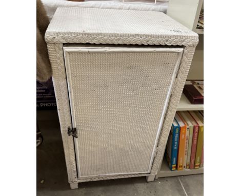 A vintage loom bedside / bathroom cupboard