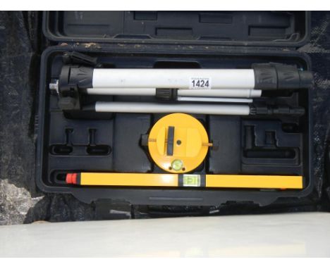 A cased tripod with level 