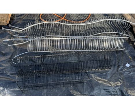 A quantity of metal CD shelving.