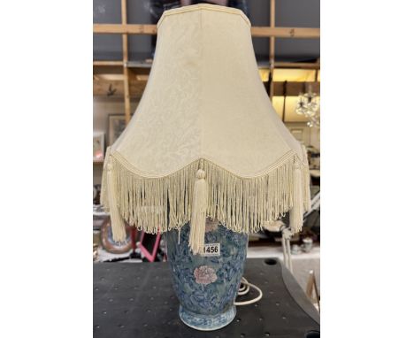 A good blue ceramic table lamp with fringed shade, COLLECT ONLY.