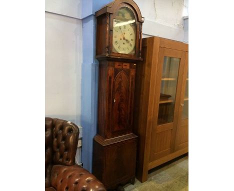A mahogany long case clock, with painted dial and eight day movement