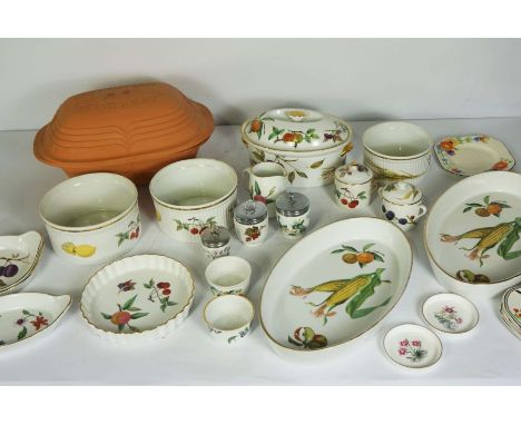 A group of Royal Worcester ‘flameproof’ porcelain ware, including a covered tureen, and two dishes decorated with damsons, al