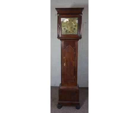 An oak 30 hour longcase clock, inscribed Tho. Wallace, Brampton, the flat topped case with 12 inch brass dial, including dumm