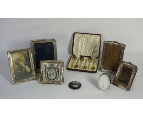 A group of six assorted silver and white metal mounted photograph frames, mainly early 20th century; together with a cased se