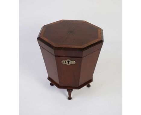 An unusual mahogany tea caddy, 19th century, in the form of a miniature George III style cellarette, of tapered octagonal for