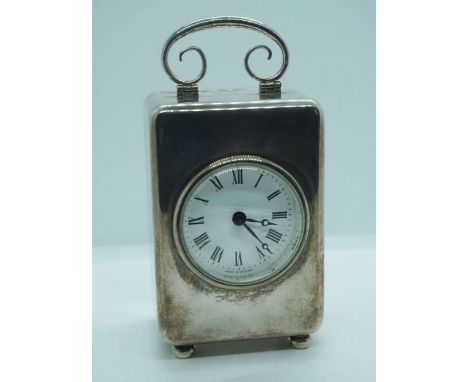 A small silver cased carriage clock, hallmarked case, London, 2001, maker RCB, with an 11 jewel movement and key, the plain c