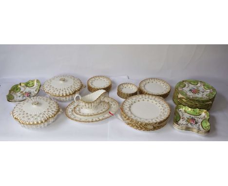 A Spode bone china part dinner service, ‘Fleur de Lys Gold’ pattern, 20th century, including two covered vegetable tureens, t