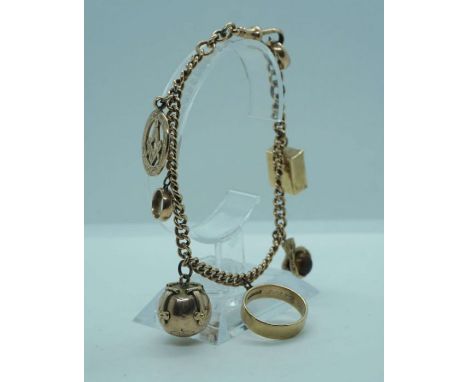 A Masonic 9 carat gold charm bracelet, the chain set with six assorted ‘charms’, including a ring; a Masonic folding ball whi